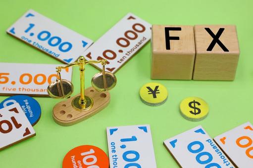 FXと書かれたブロックと天秤 FXと書かれたブロックと天秤 fx,円安,円高の写真素材