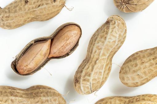 Shelled peanuts on a white background, JPG
