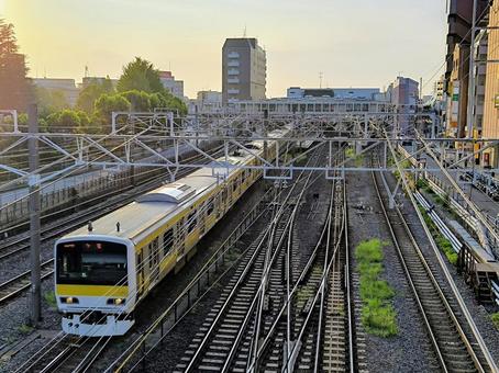 The Sobu Line rushing towards Chiba with the setting sun behind it, jr, jr east japan, sobu line, JPG