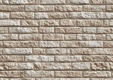 様々な質感のブロックが並ぶ石壁 様々な質感のブロックが並ぶ石壁の写真