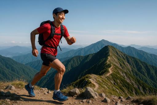 ピークを越えて次の山へ向かうランナー ピークを越えて次の山へ向かうランナーの写真