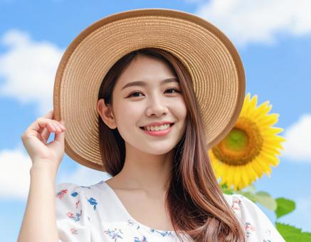 ひまわり・麦わら帽子の彼女 ひまわり・麦わら帽子の彼女の写真
