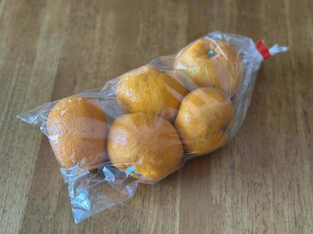 袋に入ったみかん みかん,秋,果物の写真素材