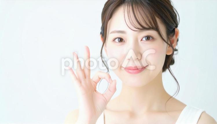 OKサインの笑顔女性 女性,笑顔,okサインの写真素材