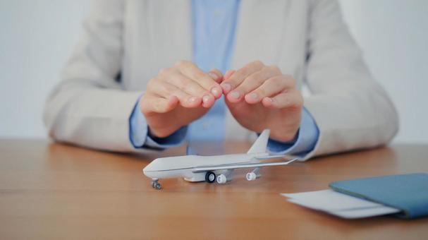 飛行機を守る手元 保険,契約,申請の写真素材