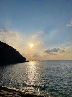 夕凪の海 夕凪の海 夕凪,海,日暮れ時の写真素材