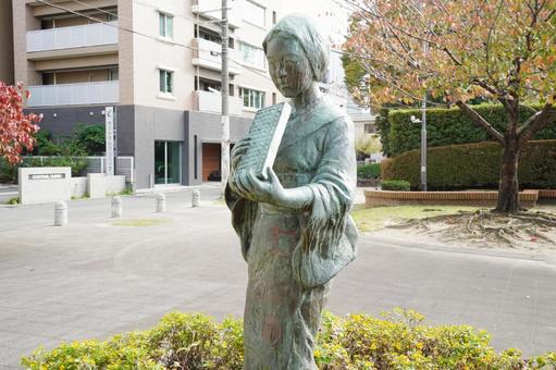 福岡 久留米 そろばん踊りの銅像1 そろばん踊りの銅像,そろばん踊り,踊りの写真素材