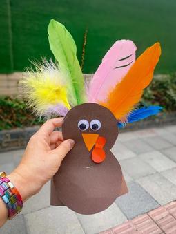 A turkey craft with striking colorful feathers, JPG A turkey craft with striking colorful feathers, JPG