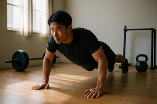 腕立て伏せをする男性 腕立て伏せをする男性の写真