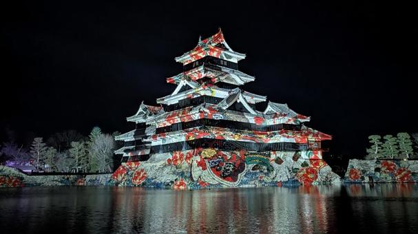 国宝松本城のプロジェクションマッピング 松本城,プロジェクションマッピング,ライトアップの写真素材