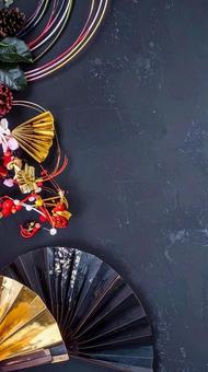 年賀状背景　和紙　和風素材　黒背景の写真