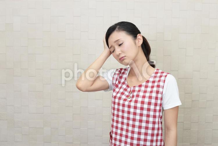 主婦　疲れた　不調 女性,主婦,家事の写真素材