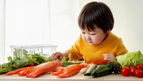 A toddler looking at fish and vegetables with interest, education, agriculture, people, JPG