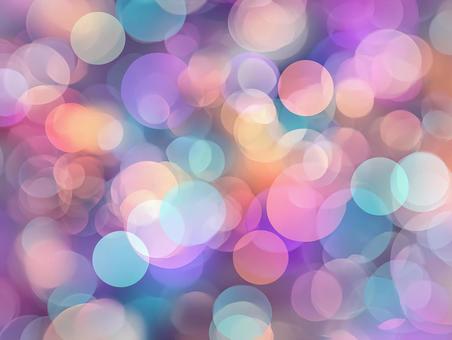 パステルカラーの光が輝く幻想的な背景の写真