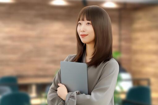 パソコンを持つ女性・ビジネスウーマン 女性,パソコン,笑顔の写真素材