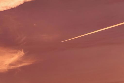Sunset sky and airplane trails, JPG