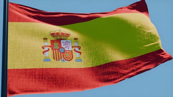 スペイン国旗・風になびく スペイン国旗・風になびくの写真