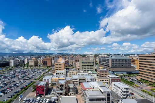 晴天の鴨池新町の町並み 晴天の鴨池新町の町並み 町並み,青空,風景の写真素材