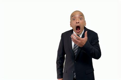 あんぐり口を開けて驚くスーツの中年男性 男性,ビジネス,スーツの写真素材