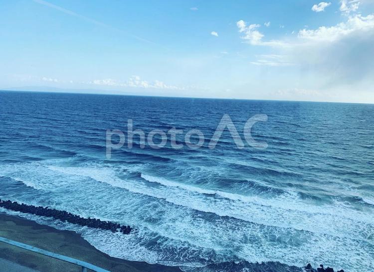 春先の北海道の波打ち際 海,波打ち際,砂浜の写真素材