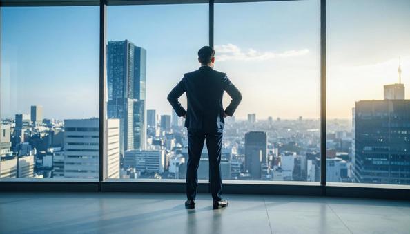 将来を考える日本人ビジネスマンの写真