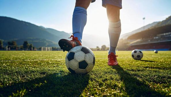サッカーボールとサッカーシューズ サッカーボールとサッカーシューズの写真