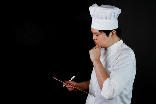 考えるシェフの横顔 考えるシェフの横顔 シェフ,料理人,コック服の写真素材