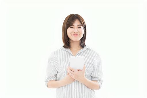 若い女性 タブレット 若い女性 タブレットの写真