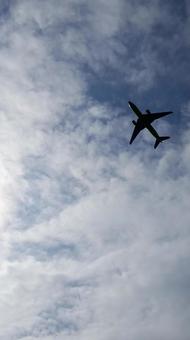 空と飛行機 空,雲,飛行機の写真素材