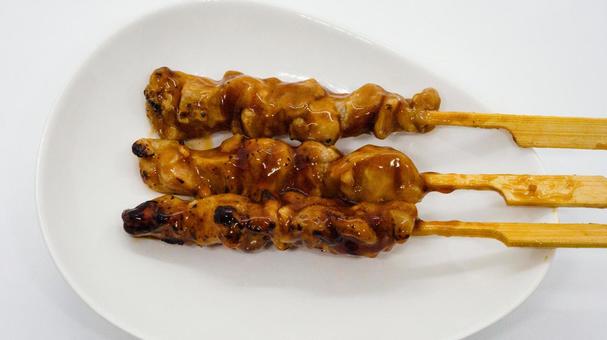 焼き鳥の串 たれ 白背景 焼き鳥の串 たれ 白背景の写真