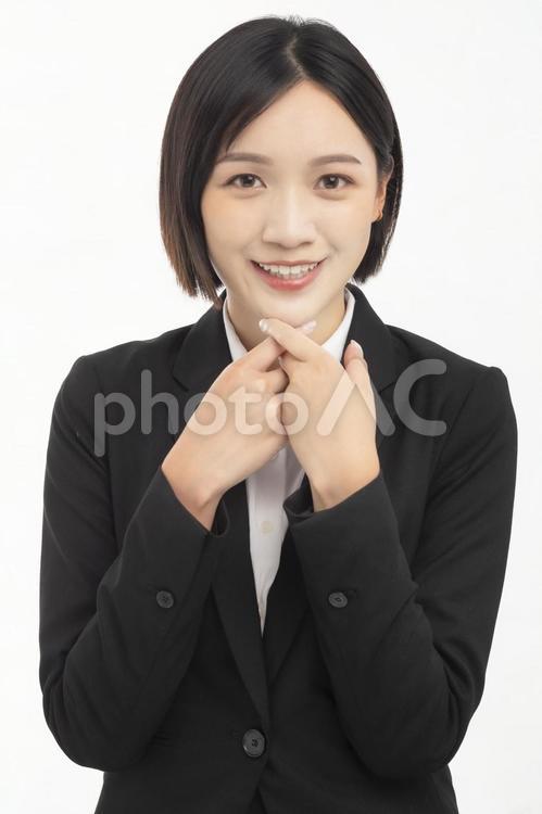 両手を合わせるOL6 女性,20代,外国人の写真素材