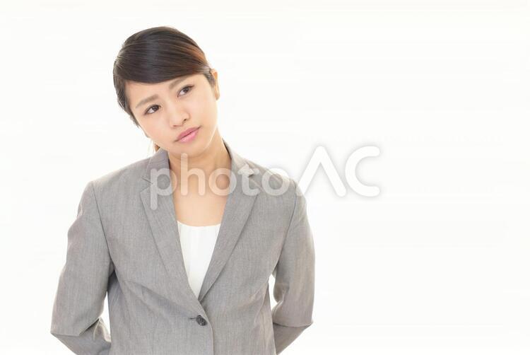 疲れた表情のビジネスウーマン 女性,ビジネウーマン,女の写真素材