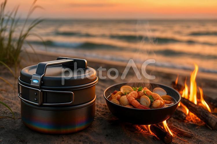 波音と焚き火に包まれる砂浜キャンプ キャンプ,海辺,クッカーの写真素材