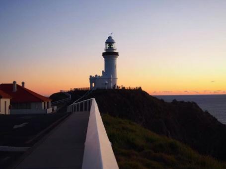 バイロンベイでの朝焼け 灯台,朝焼け,朝日の写真素材