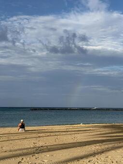 朝のカハナモクビーチと虹 ハワイ,アメリカ,オアフ島の写真素材