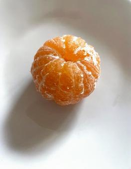 皮をむいたみかん 皮をむいたみかん ミカン,柑橘類,果物の写真素材