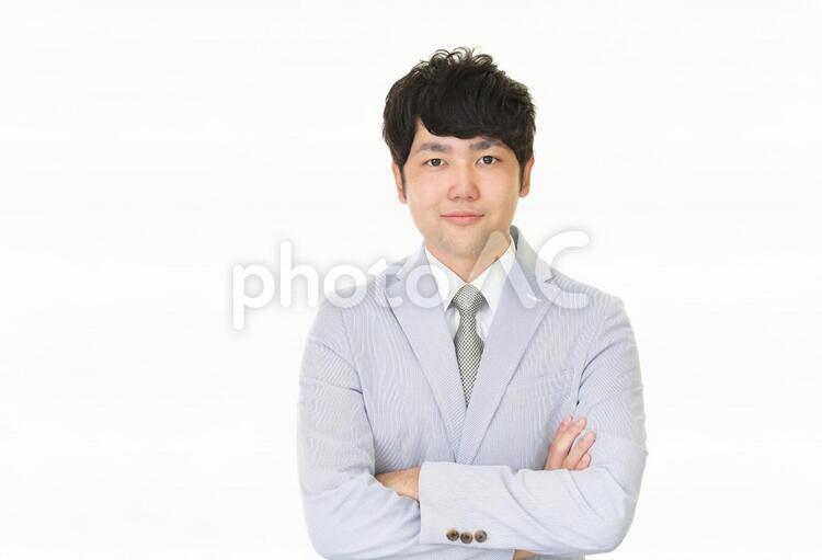 腕組をする笑顔のビジネスマン 男性,ビジネスマン,男の写真素材