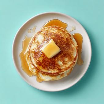 シンプルな背景の甘い朝食パンケーキ シンプルな背景の甘い朝食パンケーキの写真