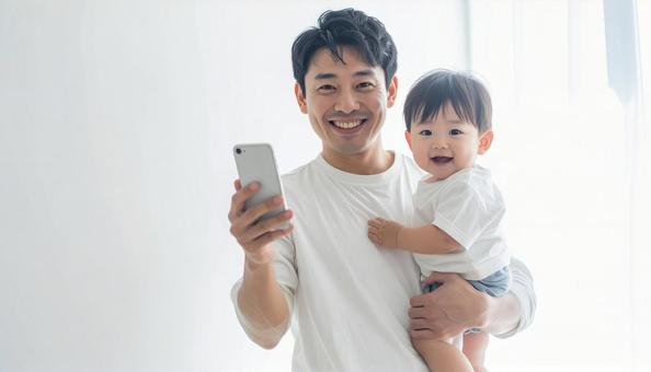 父親と子供、スマホの写真