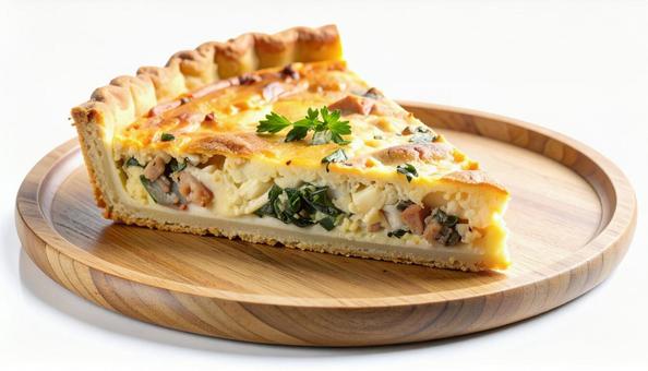 木製プレートに盛り付けられたキッシュ 木製プレートに盛り付けられたキッシュの写真