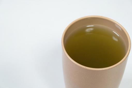 茶色の湯呑みに入った日本茶 日本茶,お茶,湯呑みの写真素材