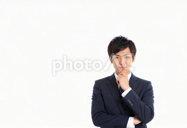 自信満々に提案するビジネスパーソン 日本人,男性,30代の写真素材