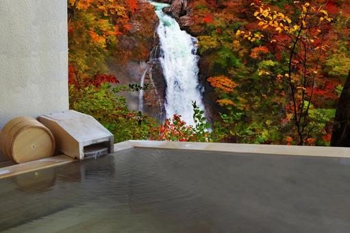 Open-air bath in the autumn leaves Open-air bath in the autumn leaves