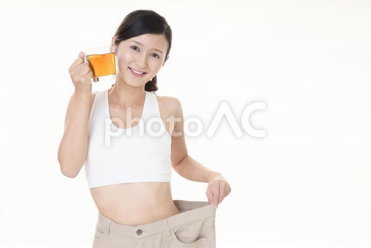 ダイエットに成功した女性 女性,女,健康の写真素材