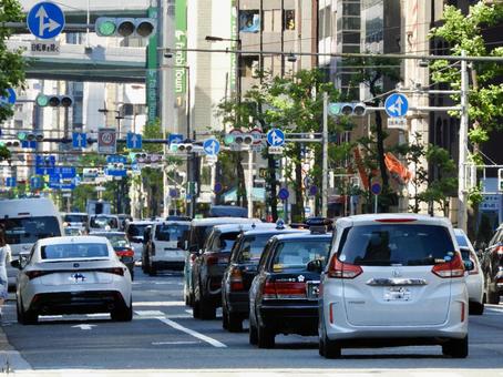 大阪市中心部堺筋を走る車 堺筋,大阪市,自動車の写真素材