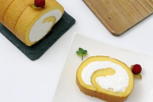 クリームロールケーキのスイーツ クリームロールケーキのスイーツ クリームロールケーキ,ケーキ,スイーツの写真素材