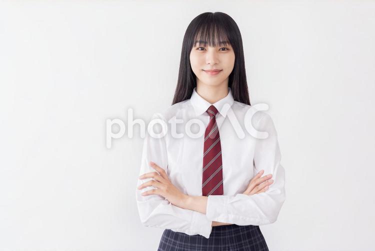 女子高生イメージ　腕組み　自信 女性,女の子,自信の写真素材