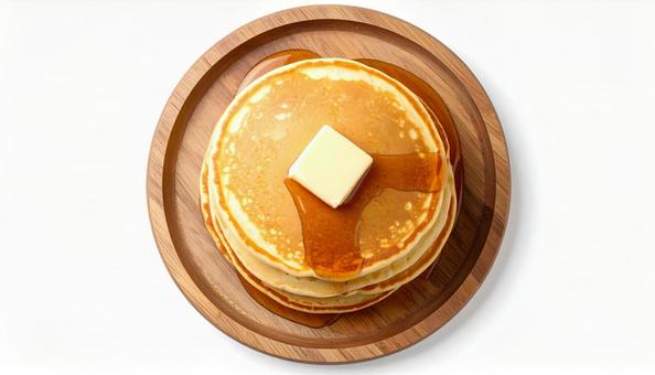 木製プレートの上のパンケーキ 木製プレートの上のパンケーキの写真