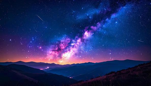 紫と青に輝く幻想的な天の川の写真