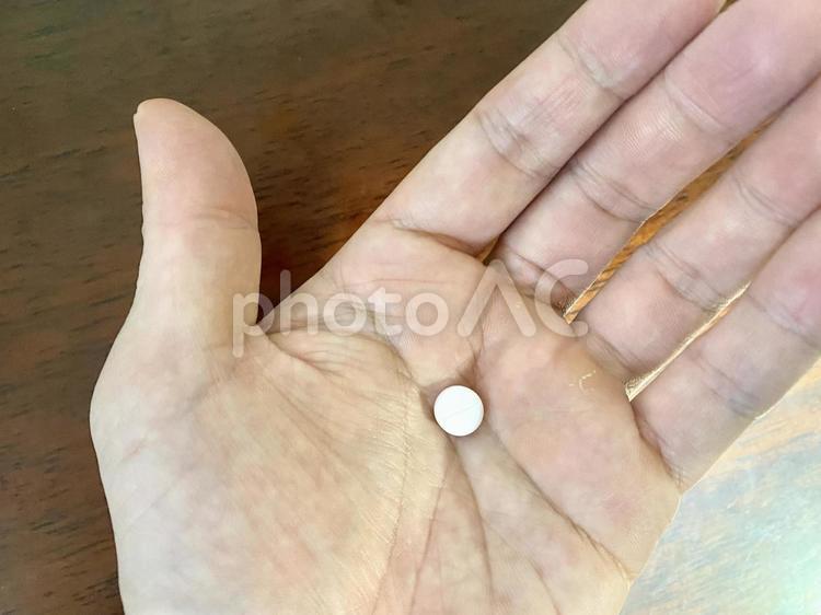 手のひらの上の錠剤 錠剤,薬,薬品の写真素材